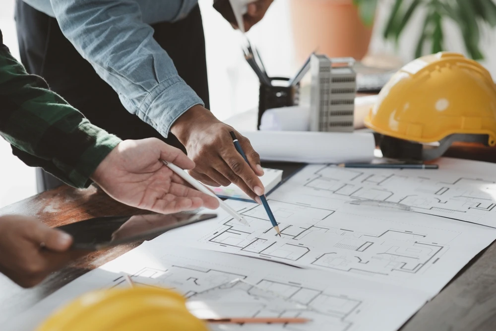 town planner in Tasmania pointing out the details in the planning permit paper